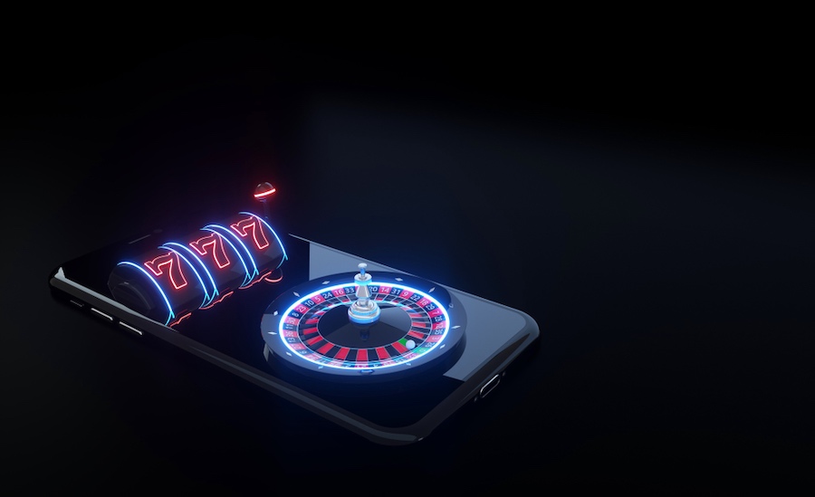 Automat i kotač ruleta na pametnom telefonu s futurističkim neonskim svjetlima