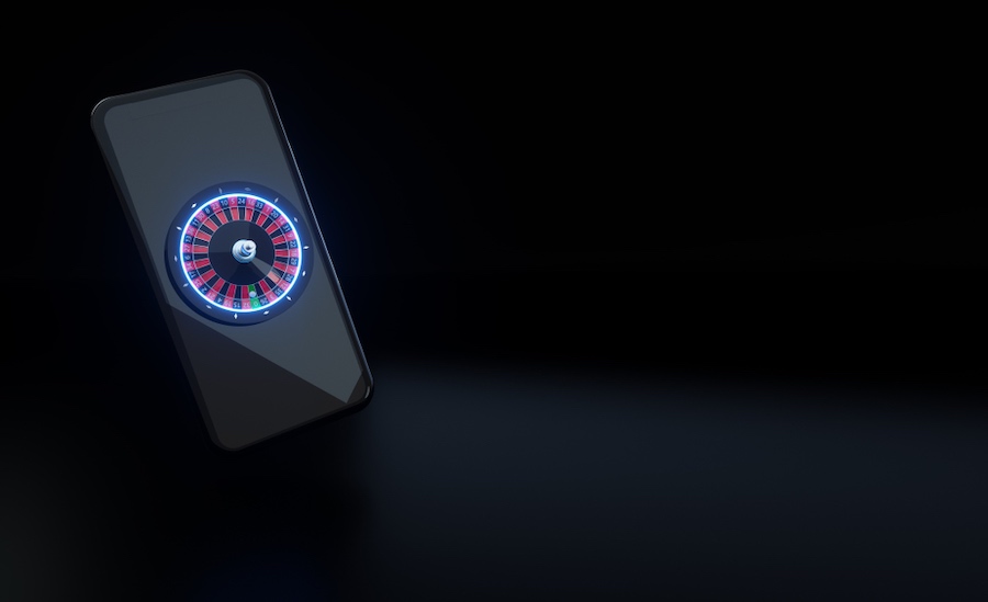 Kotač ruleta na pametnom telefonu s futurističkim neonskim svjetlima